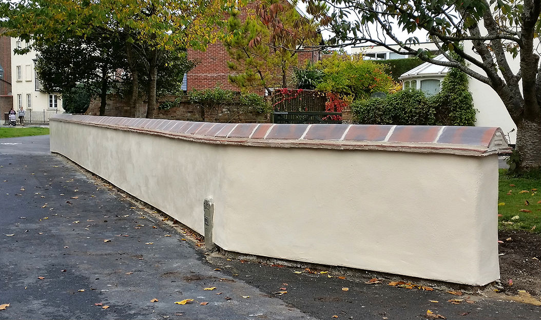 restored lime rendered wall dorset