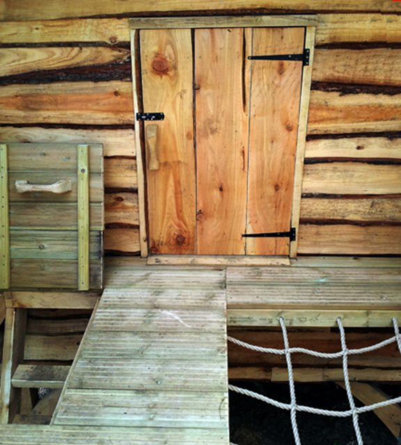 door of timber playhouse dorset