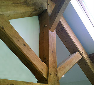 close up of oak timber frame beams in dorset